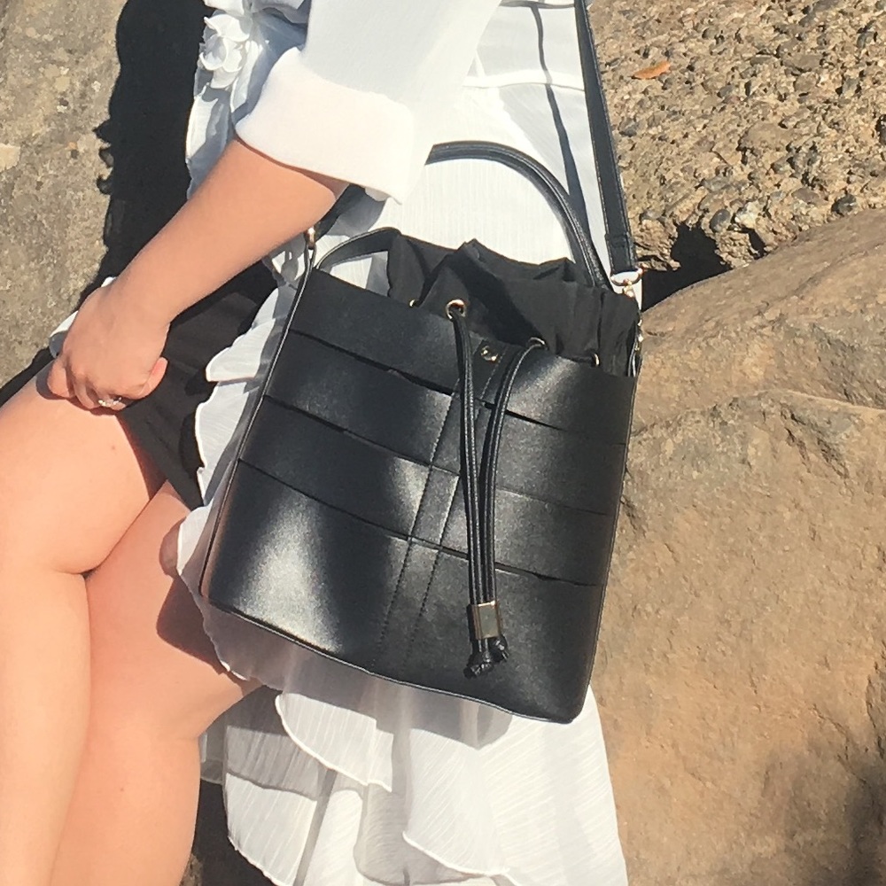 Black bucket style hand bag